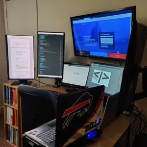 Web Developer Seven Monitor Workspace